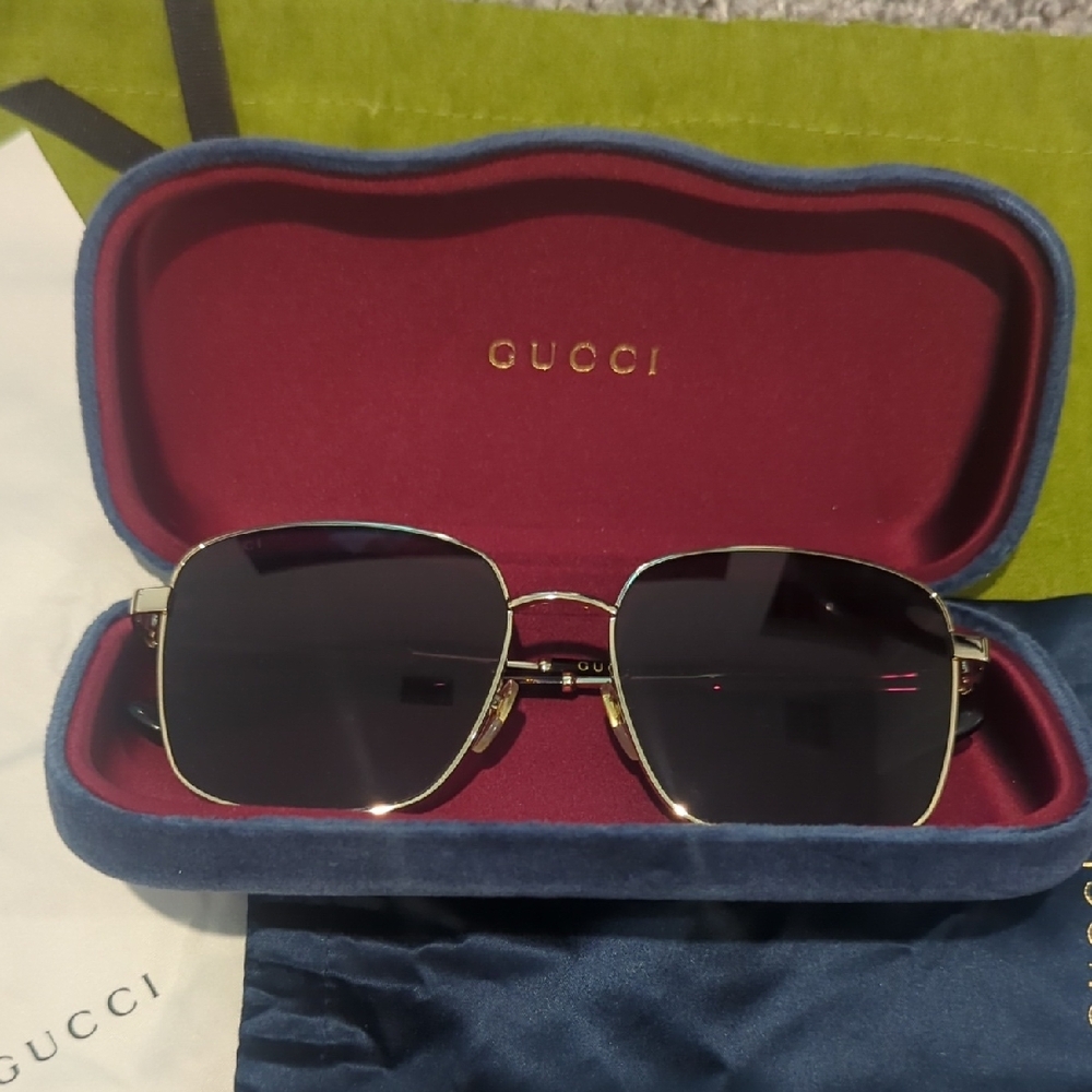 Gucci Black and Gold Sunglasses
